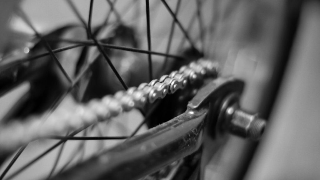 Zoom on a bike chain, black and white image